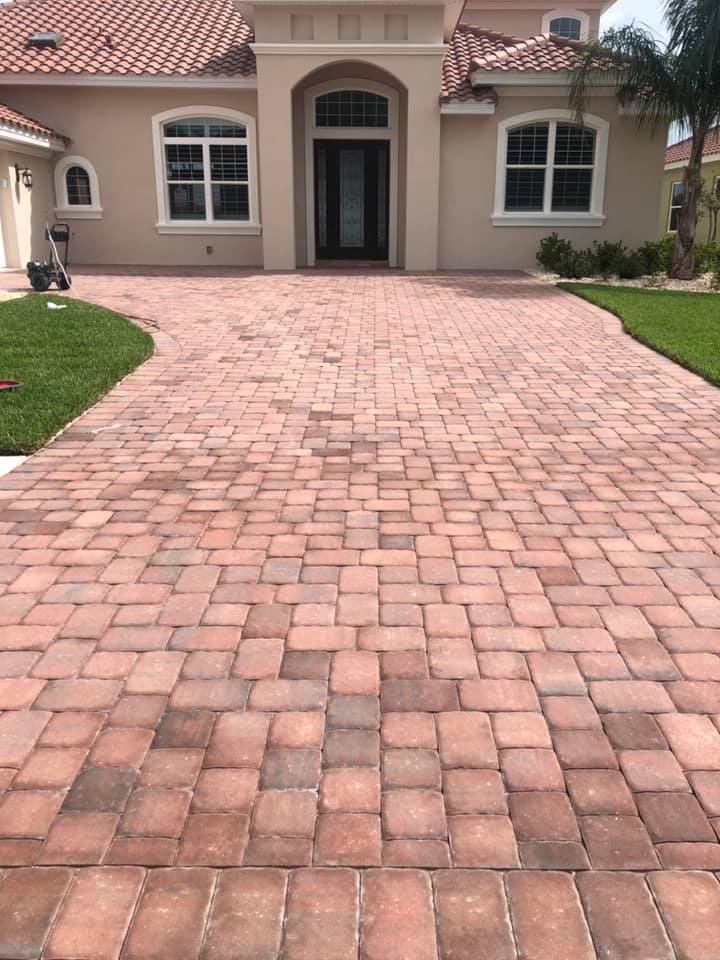 Dull driveway pavers before sealing