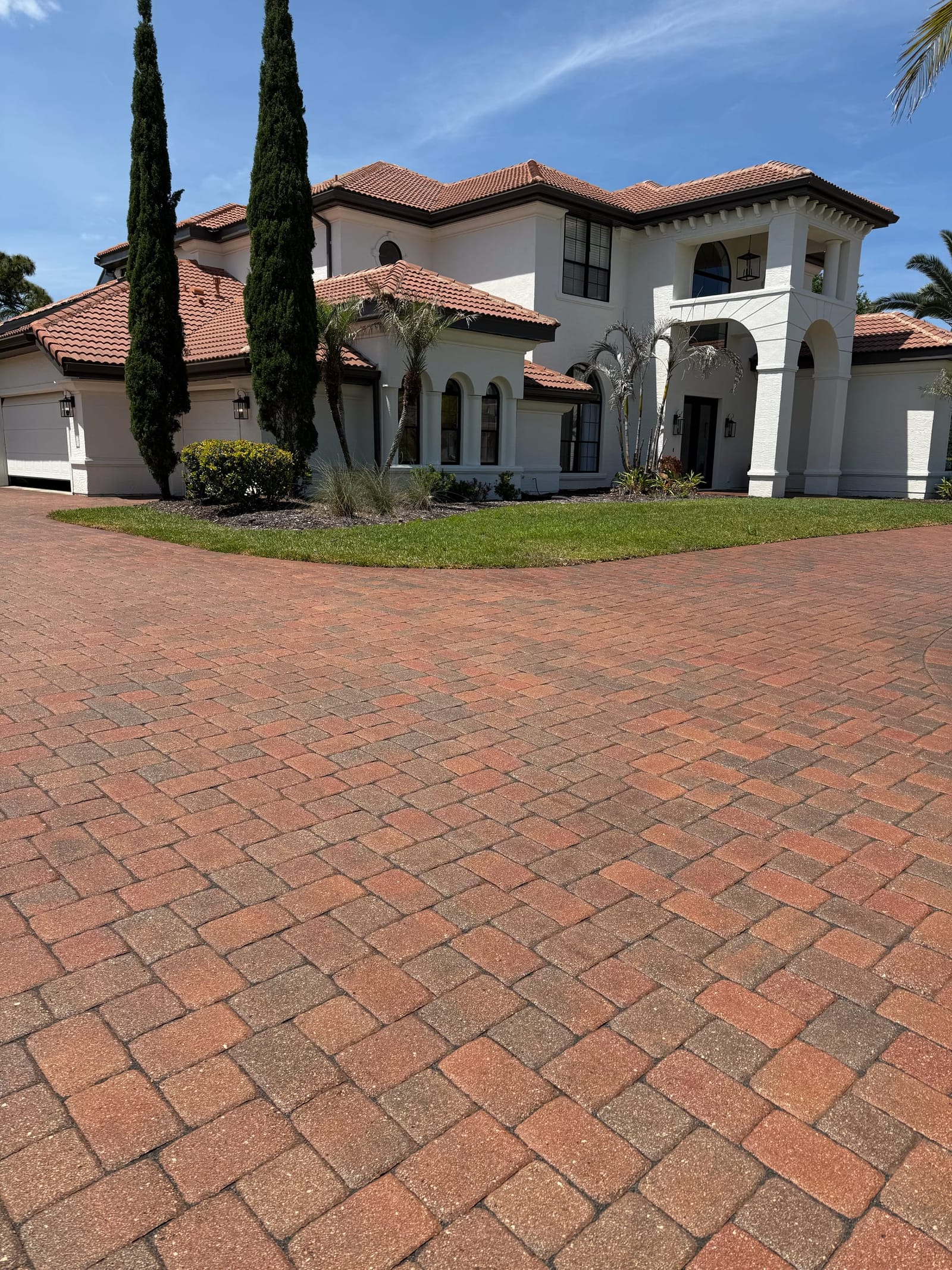 Paver driveway restoration after paver sealing by Wintz Enterprise