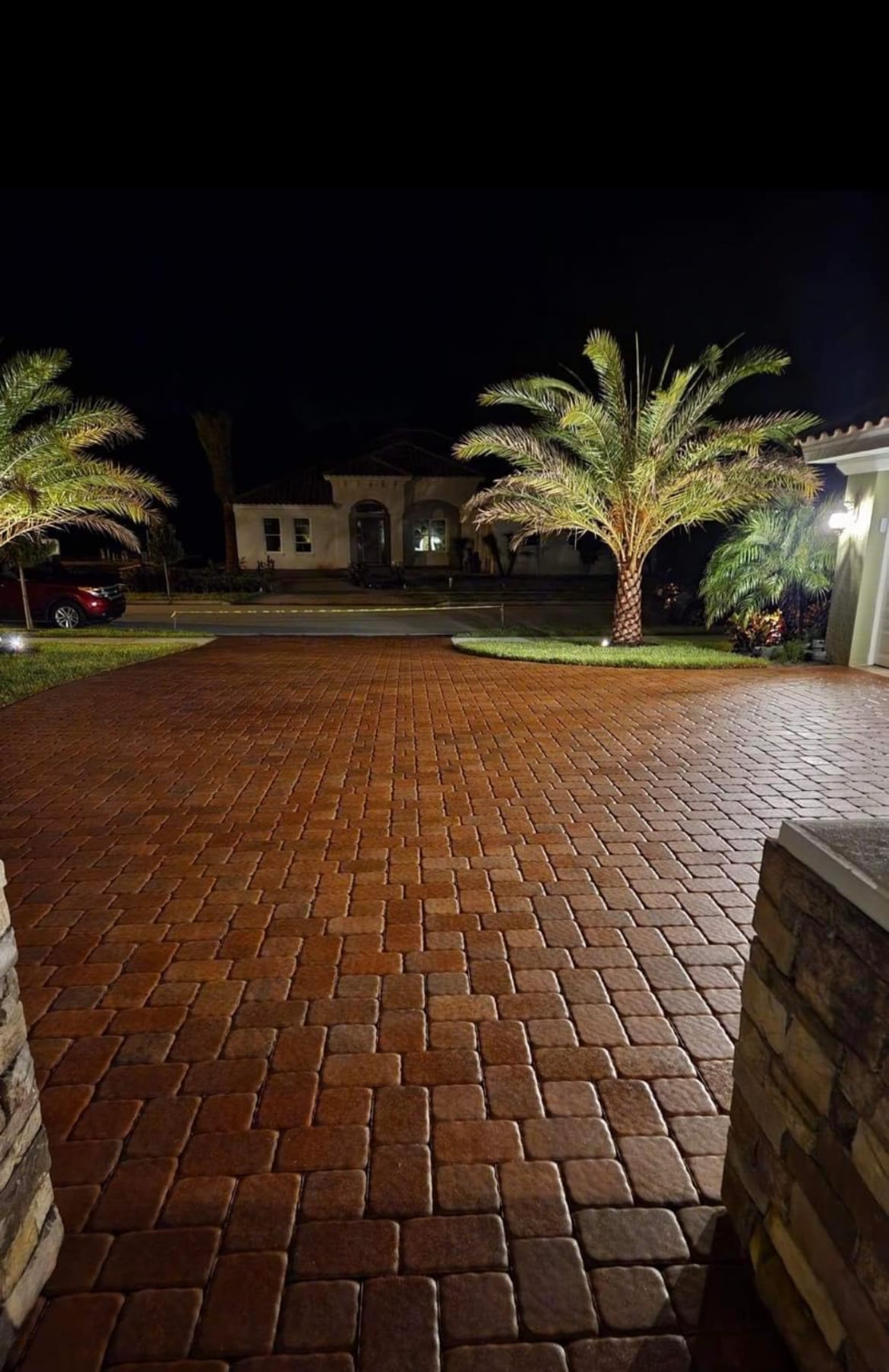 Sealed pavers after dark — paver sealing by Wintz Enterprise
