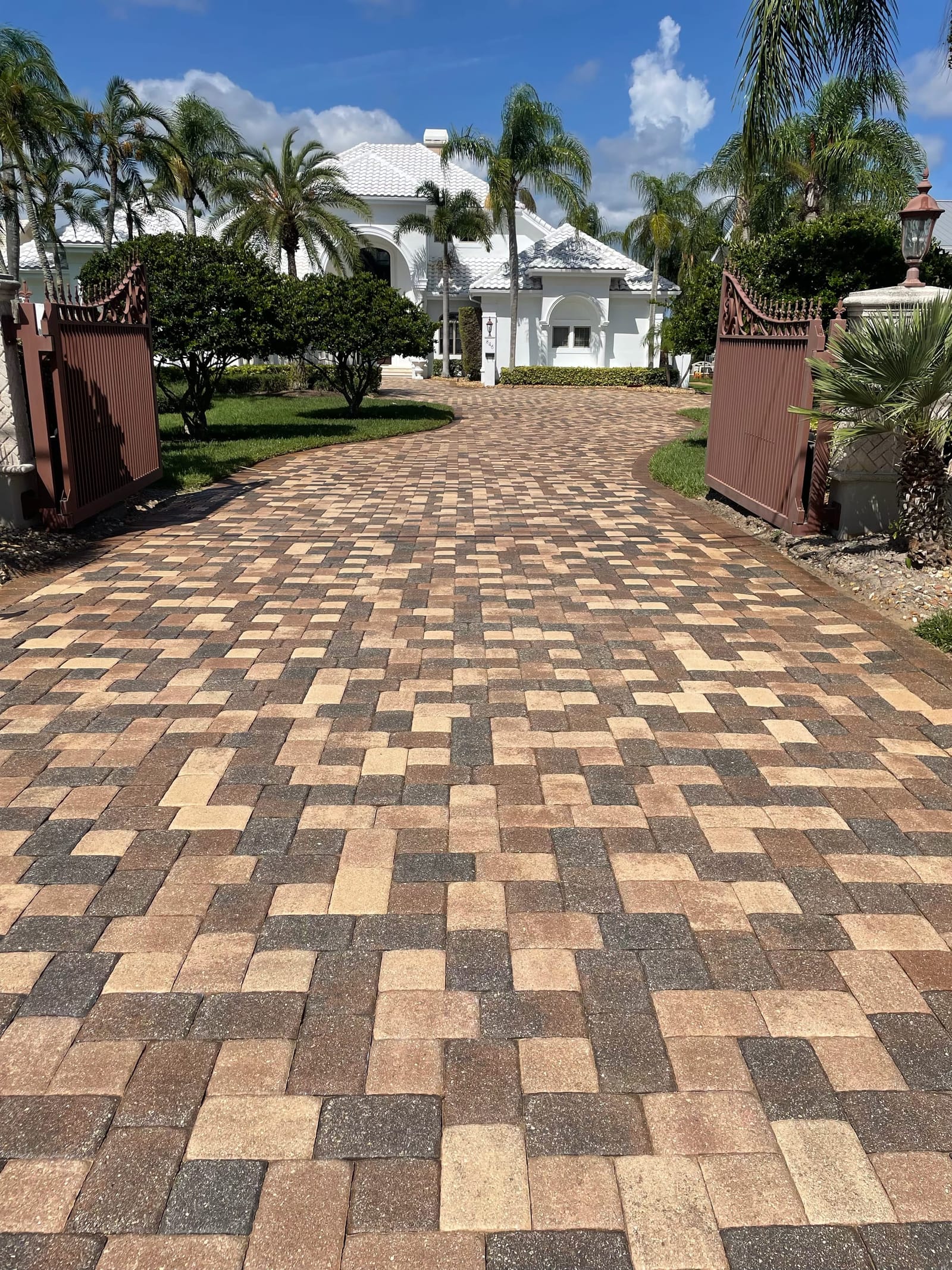 Paver driveway, wet-look finish — paver sealing by Wintz Enterprise